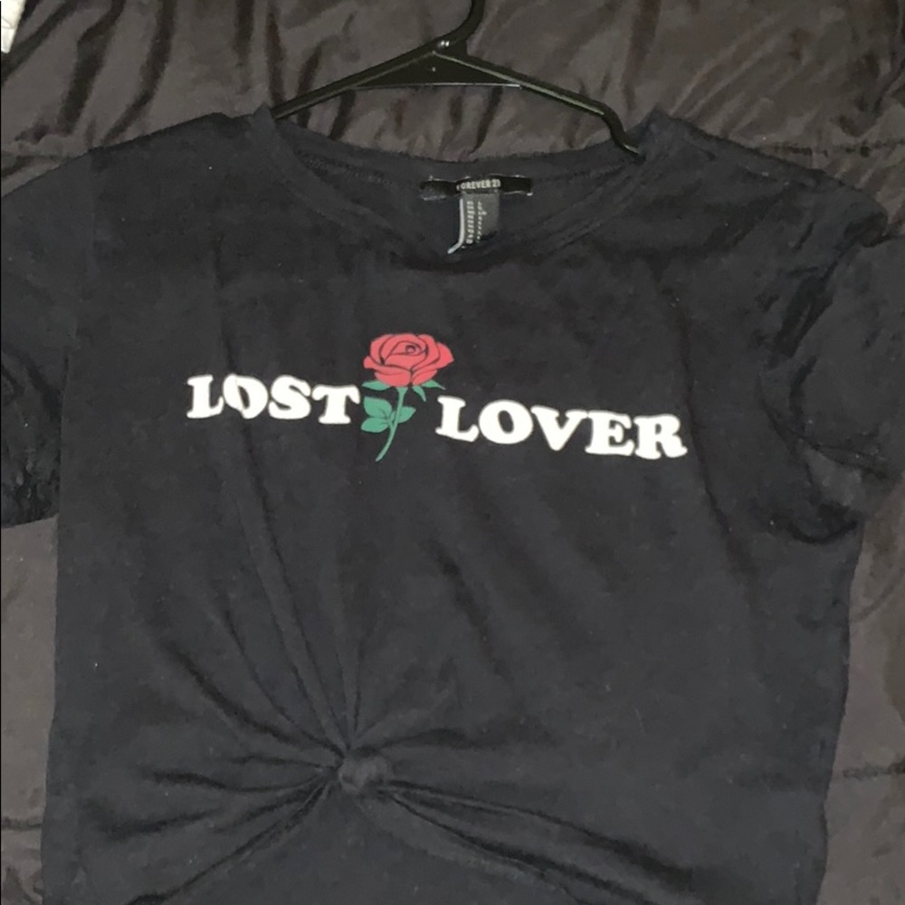 A black shirt sleeve crop top shirt.